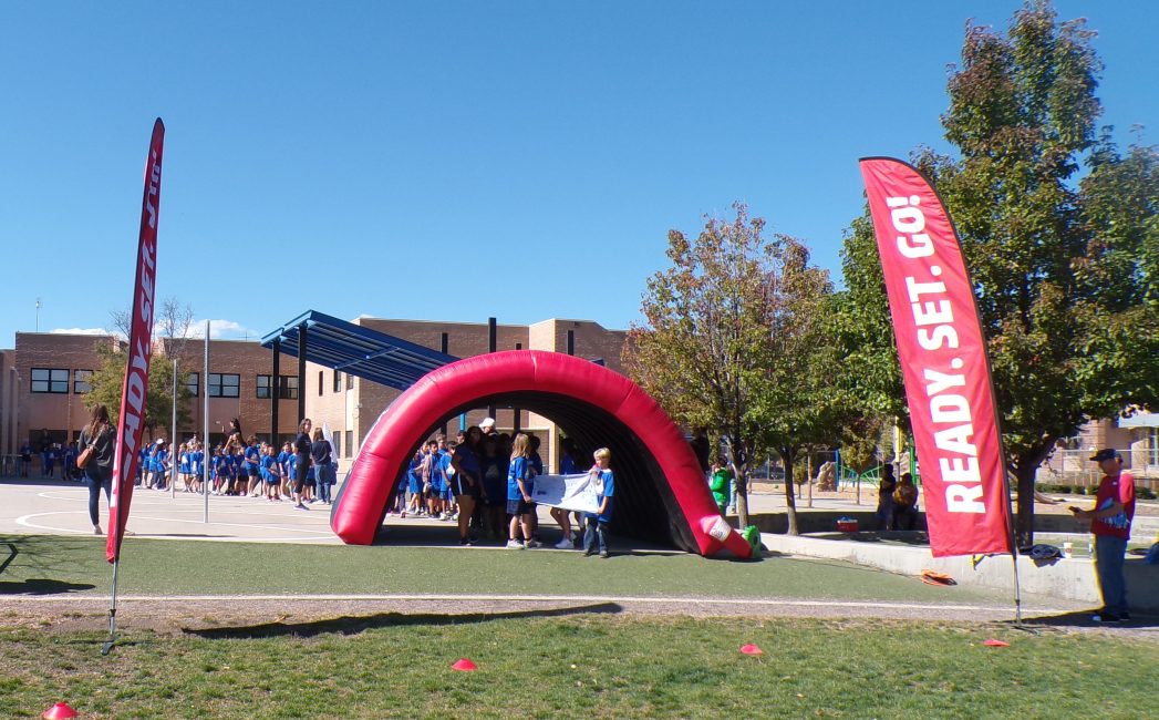 Photos of students participating in the Valdez Fun Run