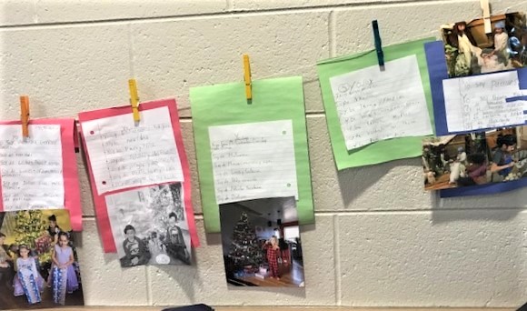 Photo of second grade students displays about holidays.