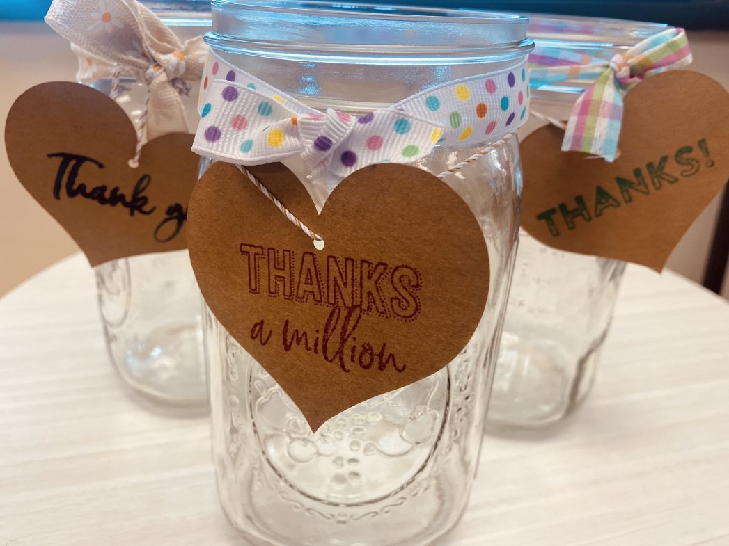 Image of 3 Mason jars with brown heart-shaped tags that say "Thank you."