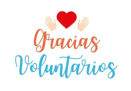 White background with hands surrounding a red heart. Red and blue text says, "Gracias Voluntarios"