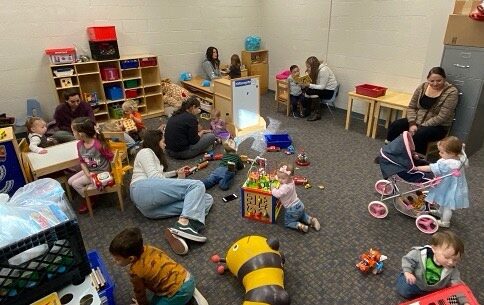 Photos: children in Programa Familiar de Lenguaje classroom