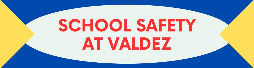 Blue background with yellow half-triangles on each side pointing at a white oval shape with red text saying, "School Safety at Valdez."